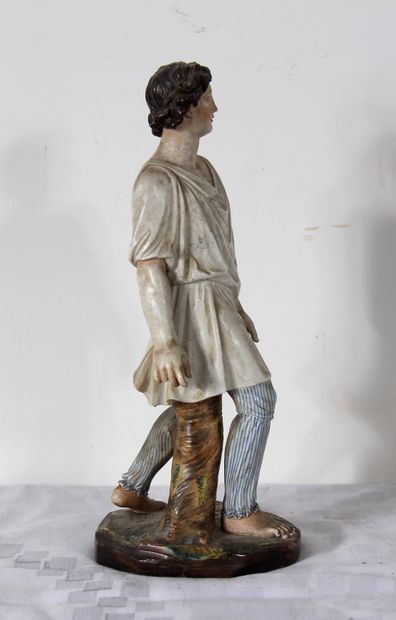 null *Sculpture en porcelaine polychrome représentant un jeune berger

H : 27 cm....