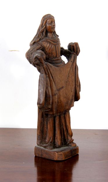 null *Statuette en bois naturel représentant Ste Véronique tenant le voile

H : 23,5...