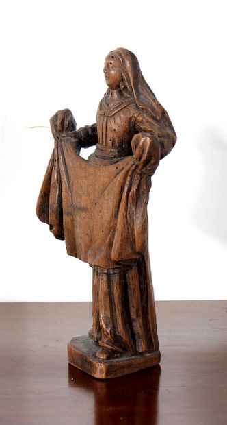 null *Statuette en bois naturel représentant Ste Véronique tenant le voile

H : 23,5...