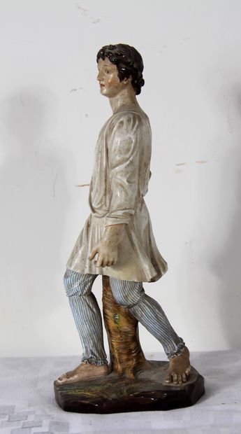 null *Sculpture en porcelaine polychrome représentant un jeune berger

H : 27 cm....