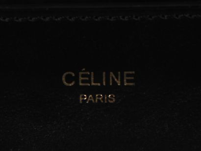 null CELINE Paris

Sac modèle Luggage en veau noir et blanc, double poignée, poche...