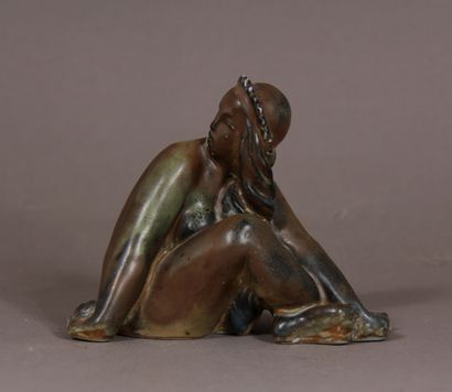 null *Ecole moderne danoise

Femme nue assise

Sculpture en céramique à glaçure marron,...