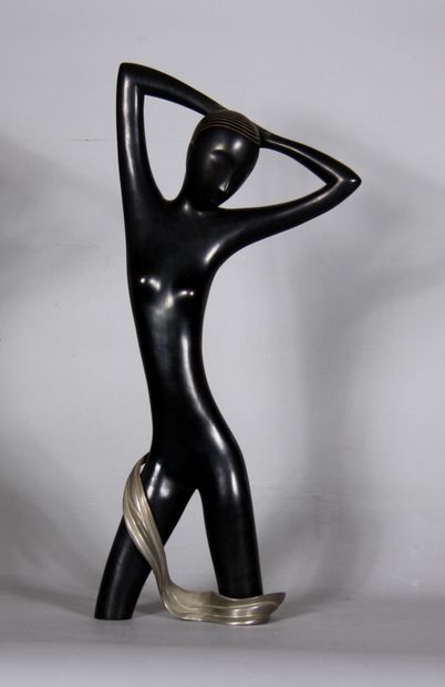 null Franz HAGUENAUER (1906-1986)

	Femme aux bras levés. 

	Sculpture en bois noirci...