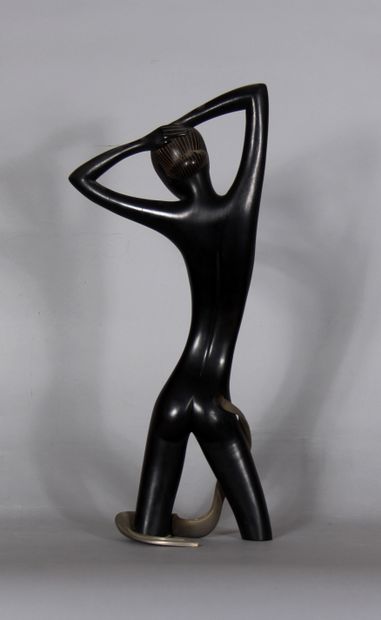 null Franz HAGUENAUER (1906-1986)

	Femme aux bras levés. 

	Sculpture en bois noirci...