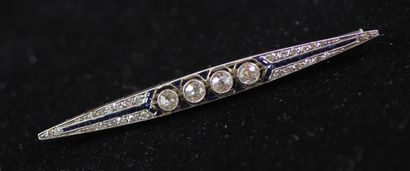null Line brooch in 18k white gold set with four antique cut diamonds (toads) and...