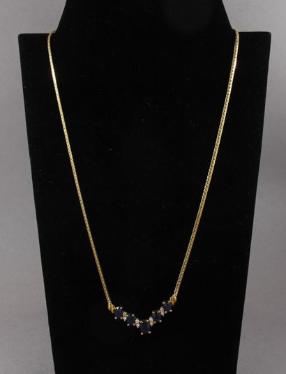 null Necklace in 18k yellow gold adorned with five sapphires, raw weight: 10.7 g...