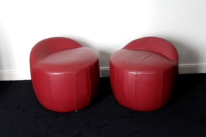 null Four round poufs with a light back in burgundy grained leatherette resting on...