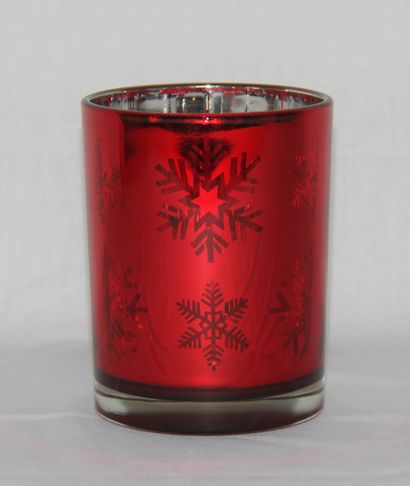 null Four circular electric candle holders in tinted glass with snowflake decoration

H...
