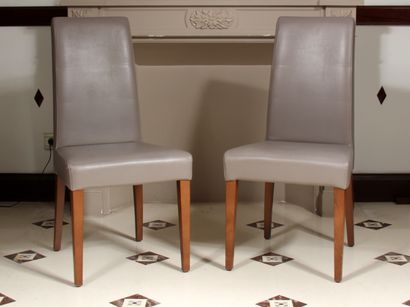 null Three high-backed chairs and four footstools in smooth grey skai, tapered and...