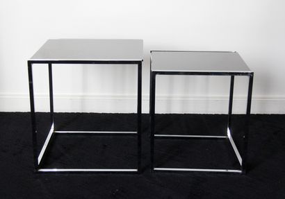 null Pair of two cubic nesting tables in chromed metal, black tinted transparent...