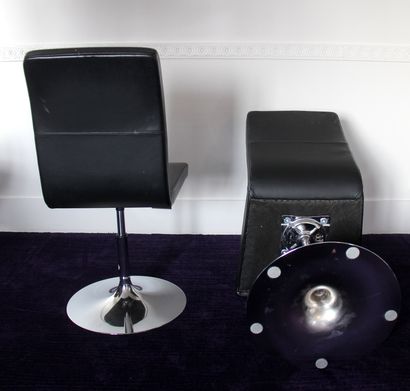 null Three swivel chairs with variable height in black grained leatherette, chrome-plated...