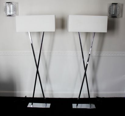 null Pair of floor lamps with chromed metal X-shaped base and two lights, cubic fabric...