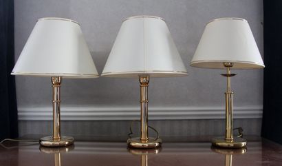 null Pair of lamp bases and a lamp base of a different model in gilt metal

H : 49...