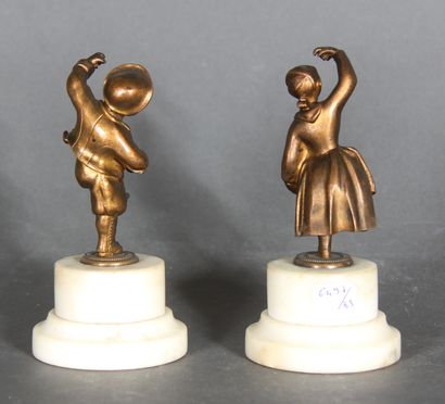 null Modern school. 

Dancing children.

Pair of sculptures with brown patina on...