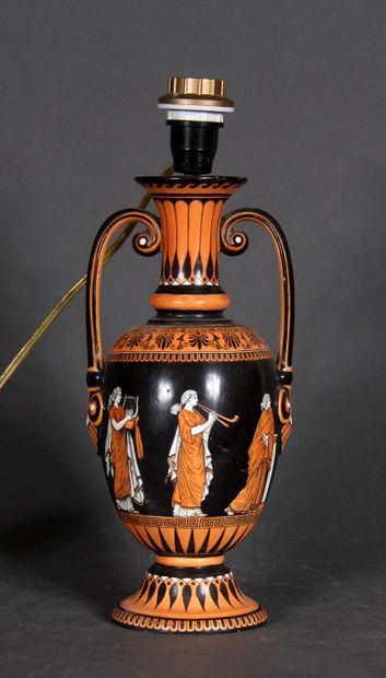 null A porcelain vase with two handles on a pedestal decorated with antique orange...