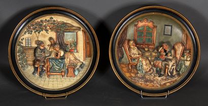 null MUSTERSCHUTZ scenes of the everyday life.

Pair of round bas-relief in polychrome...