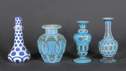 null Small lot of one vase and two bottles (missing the stoppers) in blue and transparent...