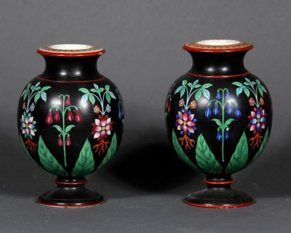 null A pair of porcelain globular vases on a pedestal and flared neck with polychrome...