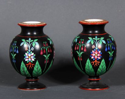 null A pair of porcelain globular vases on a pedestal and flared neck with polychrome...
