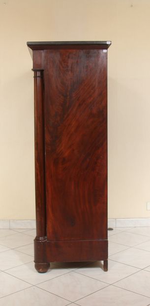 null Mahogany veneered weekly cabinet with detached columns, black marble top, 19th...