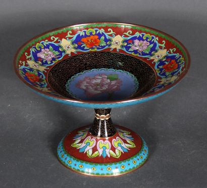 null A modern Chinese cloisonné metal bowl on a pedestal, decorated with stylized...