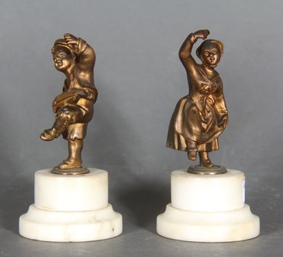 null Modern school. 

Dancing children.

Pair of sculptures with brown patina on...