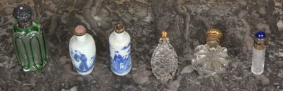 null Set of six salt and perfume bottles in glass and white-blue porcelain, two with...