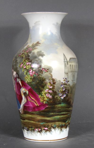 null A porcelain baluster vase with a flared neck with polychrome decoration of young...