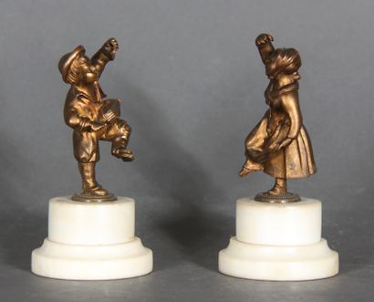 null Modern school. 

Dancing children.

Pair of sculptures with brown patina on...