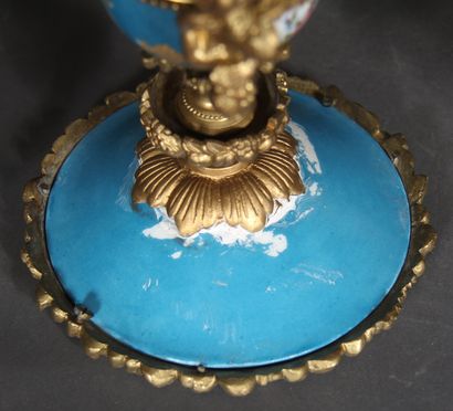 null Three polychrome porcelain display stands and metal mountings (one base marked...