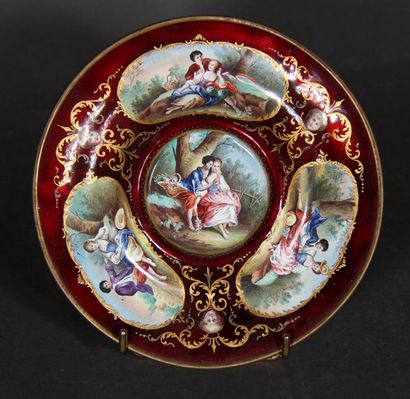null Round metal tray enamelled with a gallant scene on one side and a landscape...
