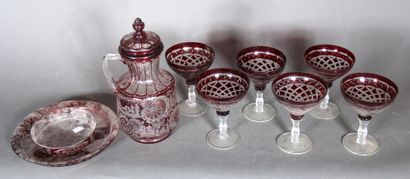 null A red transparent glass and crystal lot engraved with rocaille and various,...