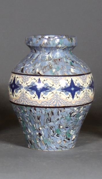 null GERBINO Vallauris 

A baluster vase in blue camaieu mixed earth, signed.

H...