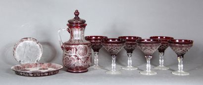 null A red transparent glass and crystal lot engraved with rocaille and various,...