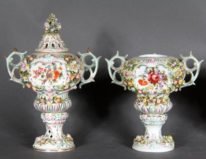 null Four polychrome porcelain perfume burners with handles, decorated with painted...