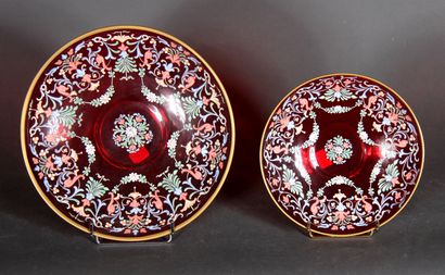 null Two round hollow dishes on heel in red transparent glass with polychrome painted...