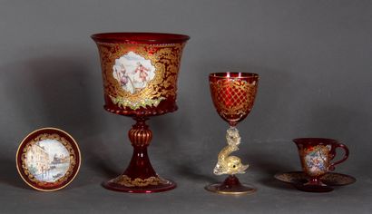 null A lot of transparent red glass with gilded rocaille decoration and polychrome...