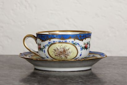 null Lot :

- A Sèvres style gilt and polychrome porcelain moustache cup and saucer,...