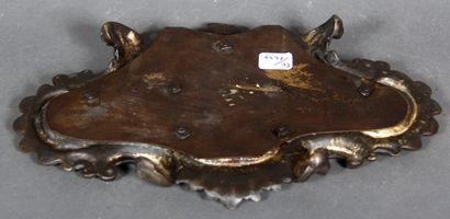 null Four-legged inkwell stand in brown patinated metal with acanthus leaves in relief.

H...
