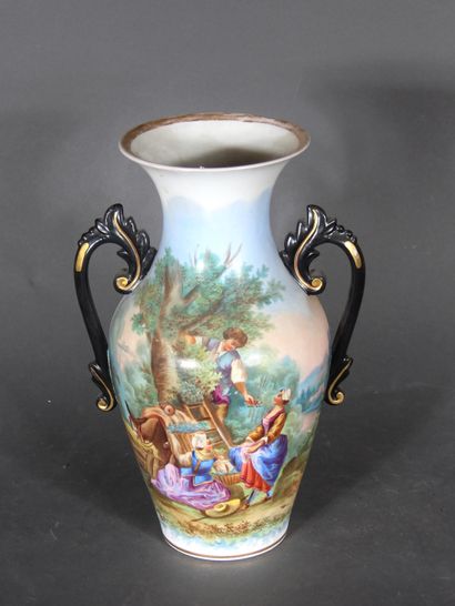 null Polychrome porcelain baluster vase with two handles decorated with cherry picking.

H...