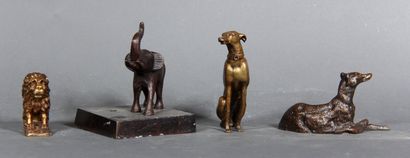null Lot en métal et bronze représentant deux lévriers, un lion et un éléphant. 

H...