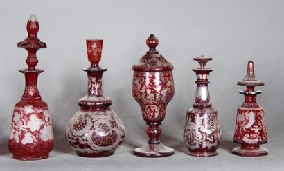 null Set of glass and transparent red crystal bottles engraved with rocaille, vines...