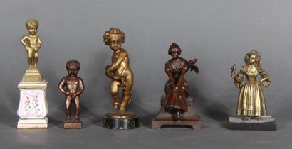 null Metal lot including two women, a musician puttot and Manne Ken Pis.

H of the...