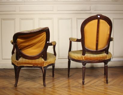 null Two cabriolets armchairs in natural wood carved with flowers and garlands, Louis...