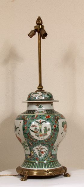 null A covered porcelain vase in the green family style, mounted as a lamp, with...