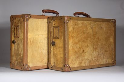 null DELION articles de voyage

Deux valises à poignets cuir