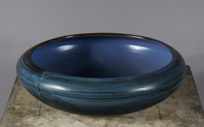 null Eugène GRANDJEAN-JOURDAN Vallauris

Grande coupe en céramique à glaçure bleu-gris...