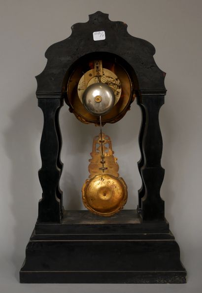 null A Louis-Philippe period ebony, bronze and brass inlaid clock with mother of...