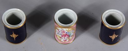 null Three midnight blue and pink porcelain pots decorated with flowers and gallant...