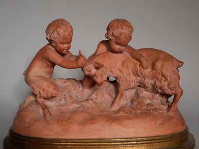 null D'AST

Young faun and a putto playing with a goat 

Terracotta sculpture signed,...